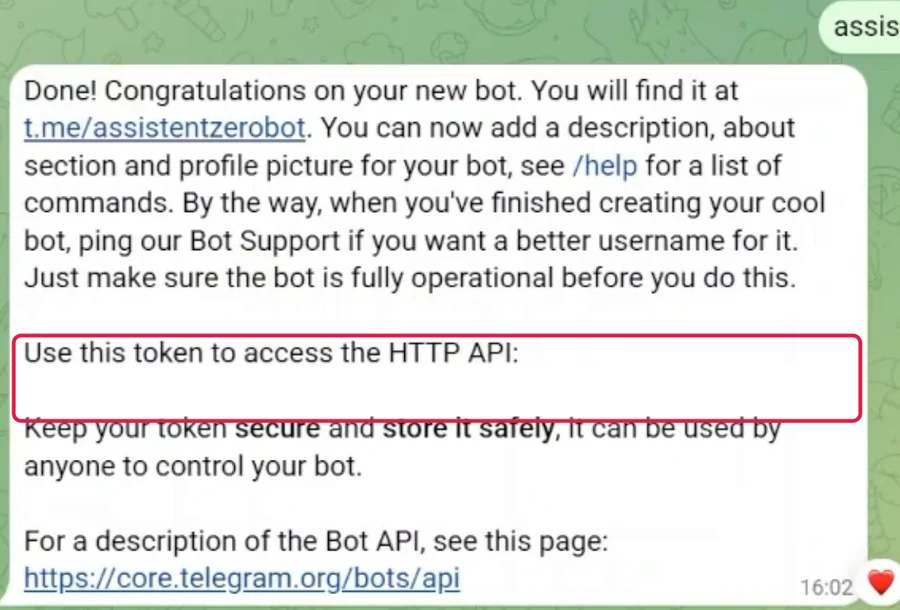 Antwort des BotFather mit rot markierter Zeile für den Token, der Token selbst ist abgedeckt